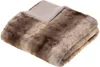 A folded faux fur blanket with a beige lining. Náhled obrázku produktu