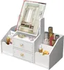 A white makeup organizer with a mirror and drawers, filled with various cosmetic products. Náhled obrázku produktu