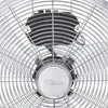 Close-up view of the front grille and motor housing of a silver fan. Produktbild-Vorschau