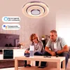 A father and son are sitting on a couch in a living room, looking at a table with smart devices. Produktbild-Vorschau