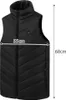 A black heated vest is shown laid flat, with measurement lines indicating its dimensions. Voir les images du produit