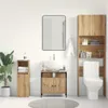 A clean, modern bathroom with a sink vanity, toilet, and storage cabinets. Náhled obrázku produktu