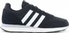 A side view of a black Adidas sneaker with white stripes. Produktbild-Vorschau