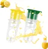 Two manual lemon juicers with yellow and green caps, with lemon juice splashing around them, and a whole lemon with a juicer inserted in the bottom right corner. Produktbild-Vorschau