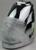 A close-up shot of a black and chrome ice crusher with a clear plastic bag covering part of it, set against a light gray background. Náhled obrázku produktu