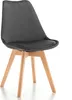 A single gray velvet dining chair with wooden legs, presented on a white background. Podgląd zdjęcia produktu