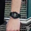 A person's arm wearing a black G-Shock watch. Anteprima dell’immagine prodotto