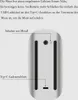 The underside of a silver computer mouse with labels pointing to its charging port and power switch. Produktbild-Vorschau