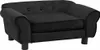 A black plush dog sofa is shown from a front-side angle against a white background. Náhled obrázku produktu
