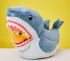 A plush toy shark with its mouth open, revealing a smaller plush toy duck inside. Podgląd zdjęcia produktu