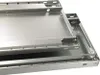 Close-up of stacked metal shelves or trays. Voir les images du produit
