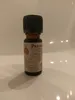 Kleine braune Flasche mit einem schwarzen Verschluss. Auf dem Etikett steht "Patchouli". Produktbild-Vorschau