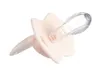 A close-up studio shot of a baby pacifier against a white background. Produktbild-Vorschau