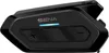 A black Sena communication device for motorcycles, shown from a side angle. Podgląd zdjęcia produktu
