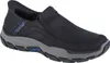 A single black Skechers slip-on shoe with a gray sole is shown against a white background. Produktbild-Vorschau