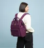 A woman wearing a backpack. Náhľad obrázku produktu