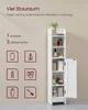 A white bathroom cabinet with its door open, displaying various items inside. The wall behind it has marketing text and icons. Produktbild-Vorschau