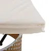 A close-up view of the zipper on a beige cushion of an outdoor furniture set. Voir les images du produit
