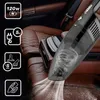 A handheld vacuum cleaner is shown being used to clean the interior of a car, with various icons indicating its features. Náhled obrázku produktu