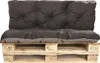 A set of black and gray cushions placed on a wooden pallet, designed to function as outdoor garden furniture. Produktbild-Vorschau