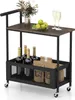 A product shot of a bar cart with bottles, fruit, and glasses. Anteprima dell’immagine prodotto