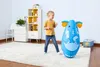 A young girl plays with a blue inflatable elephant bop bag in a child's room. Produktbild-Vorschau