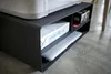 A printer stand with storage, holding a printer, paper, and a laptop. Produktbild-Vorschau