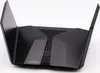 A black Netgear Nighthawk wireless router with its antennas extended, photographed against a white background. Podgląd zdjęcia produktu