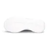 The sole of a sneaker is shown against a white background. Voir les images du produit