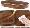 A collage showing a bar stool seat, a close-up of the wood grain with a screwdriver, and a hand wiping the surface with a wet wipe. Produktbild-Vorschau
