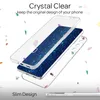 A clear phone case is shown with a blue glittery insert, with confetti scattered around. Produktbild-Vorschau
