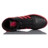 A top-down view of a black and red Adidas sneaker. Podgląd zdjęcia produktu