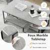 A faux marble coffee table with shelves, featuring product feature callouts. Produktbild-Vorschau