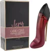 Parfumflakon in Form eines glitzernden roten High Heels mit goldener Stiletto-Ferse, daneben glamouröse Verpackung von Carolina Herrera Very Good Girl Glam. Podgląd zdjęcia produktu