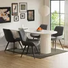 A dining room setting with a table and chairs. Voir les images du produit