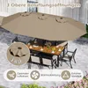 An outdoor dining set with a large umbrella, set on a patio. Podgląd zdjęcia produktu