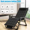 A black folding chair is shown in a room with a window in the background. Text overlays describe the chair's features. Voir les images du produit