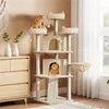 A multi-level cat tree with two cats, placed in a room with a dresser and a window. Podgląd zdjęcia produktu