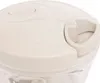 A close-up view of the lid and handle of a manual food chopper. Voir les images du produit