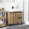 A bathroom vanity with a vessel sink and faucet, set against a tiled wall. Podgląd zdjęcia produktu