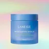 A blue jar of Laneige Water Sleeping Mask_Ex is centered against a soft, pastel-colored gradient background. Náhľad obrázku produktu