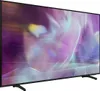 A side view of a Samsung QLED television with a colorful abstract image displayed on its screen. Produktbild-Vorschau