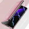 A pink flip case for a Samsung Galaxy Z Fold 3 5G is shown open, revealing the phone's screen displaying a purple lightning graphic. The case has a reflective, mirror-like finish. Produktbild-Vorschau