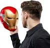 A person is holding an Iron Man helmet. Podgląd zdjęcia produktu