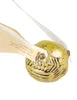 A close-up of a golden snitch replica. Náhled obrázku produktu