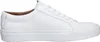 A side view of a white leather sneaker. Produktbild-Vorschau