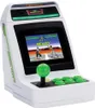 A white Sega Astro City Mini V retro console with a green joystick and buttons, displaying a fighting game on its screen. Podgląd zdjęcia produktu