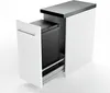 A black trash can is pulled out of a white cabinet on a white background. Produktbild-Vorschau