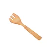 A single bamboo salad fork on a white background. Podgląd zdjęcia produktu