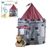 A child is playing inside a toy castle tent, with the product packaging visible in the background. Náhled obrázku produktu